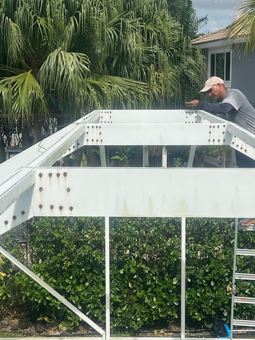 Worker assembling enclosure frame